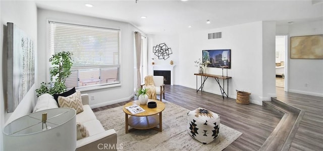 235 Main St Unit 118, Venice, CA 90291 - living area with a fireplace, wood finished floors, and recessed lighting