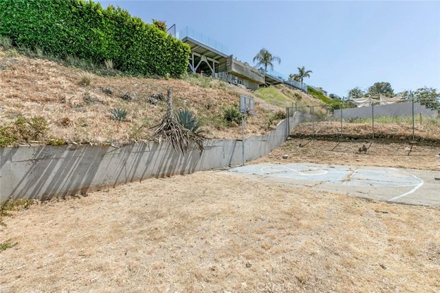view of yard with fence