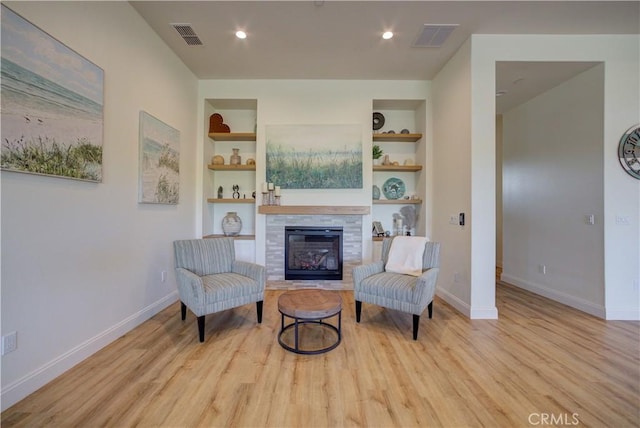 851 Trail View Pl, Nipomo, CA 93444 - living area with a glass covered fireplace, baseboards, wood finished floors, and recessed lighting