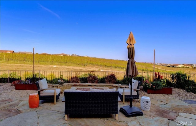 851 Trail View Pl, Nipomo, CA 93444 - view of patio / terrace with a fenced backyard, an outdoor living space with a fire pit, and a view of rural / pastoral area