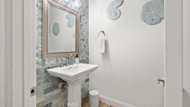 851 Trail View Pl, Nipomo, CA 93444 - half bathroom with baseboards and wood finished floors