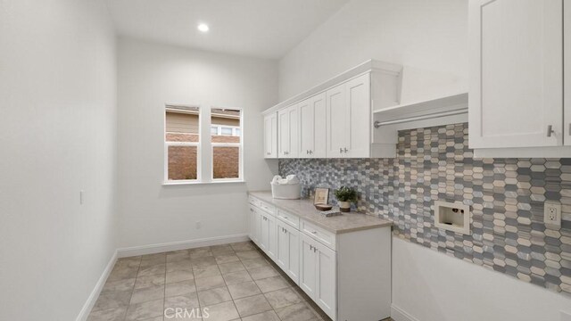 851 Trail View Pl, Nipomo, CA 93444 - kitchen featuring decorative backsplash, white cabinetry, light countertops, recessed lighting, and light tile patterned floors