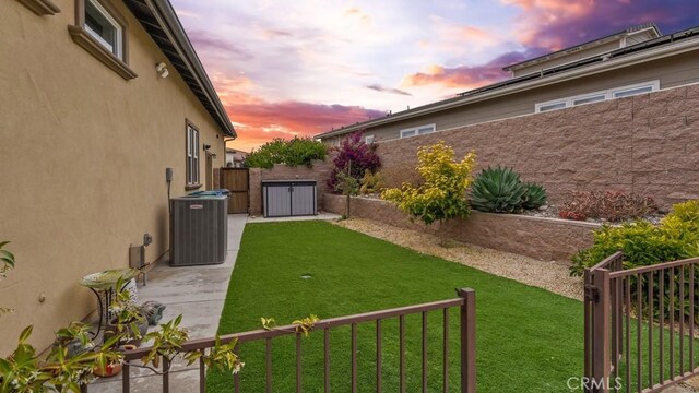 851 Trail View Pl, Nipomo, CA 93444 - yard at dusk with a gate and a fenced backyard