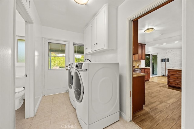 2520 Louise Ave, Arcadia, CA 91006 - laundry room featuring washing machine and clothes dryer, baseboards, and cabinet space
