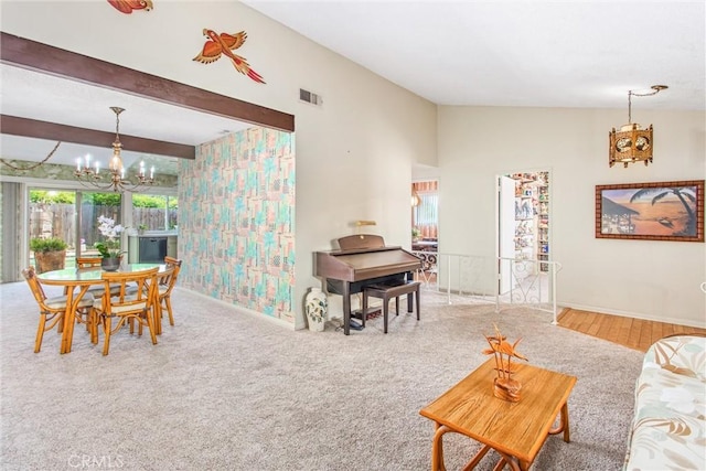 2605 La Praix St, Highland, CA 92346 - living room featuring a chandelier, baseboards, and beam ceiling