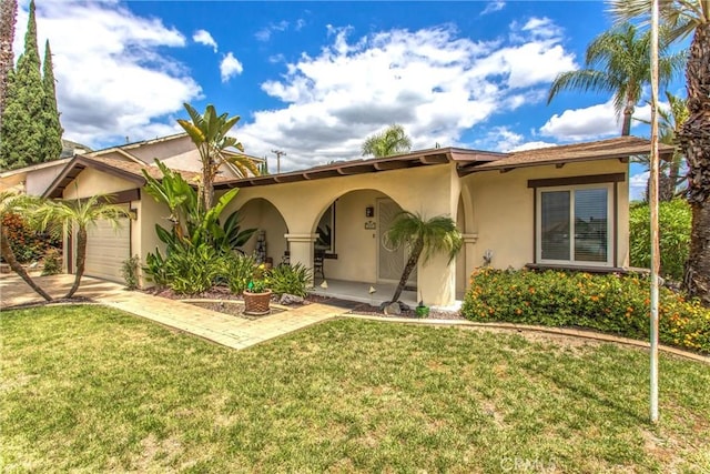 2605 La Praix St, Highland, CA 92346 - view of front of home featuring stucco siding, a front yard, and a garage