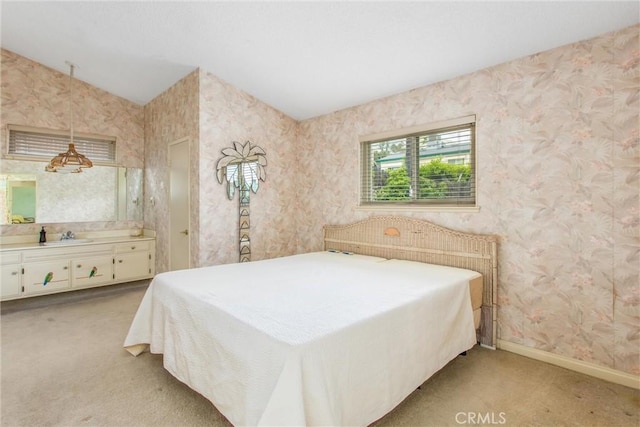 2605 La Praix St, Highland, CA 92346 - bedroom with vaulted ceiling, light carpet, baseboards, and wallpapered walls