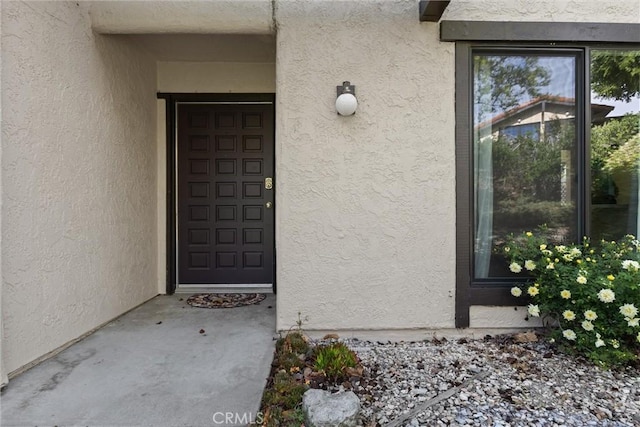 46 Los Palos Dr, San Luis Obispo, CA 93401 - doorway to property with stucco siding