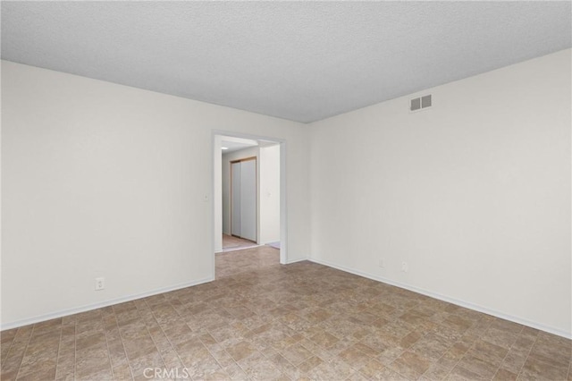 46 Los Palos Dr, San Luis Obispo, CA 93401 - unfurnished room with stone finish flooring and baseboards