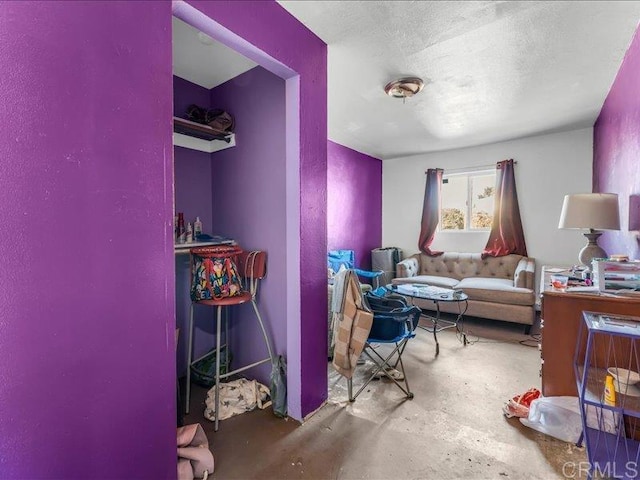 2049 Madera St, Lemon Grove, CA 91945 - bedroom featuring unfinished concrete floors and a textured ceiling