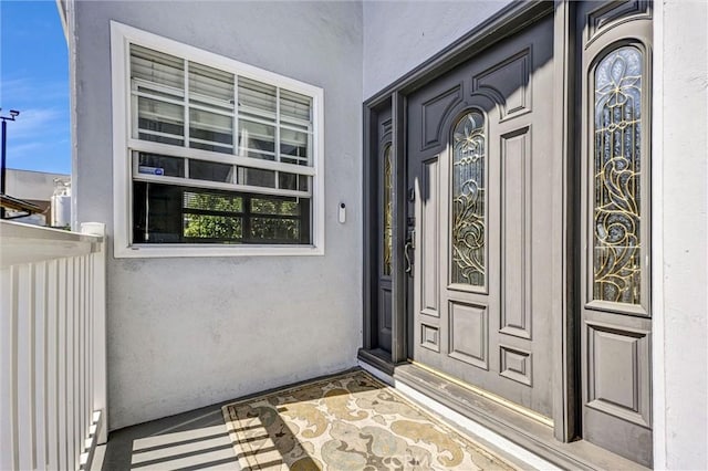 1850 W 186th St, Torrance, CA 90504 - doorway to property featuring stucco siding