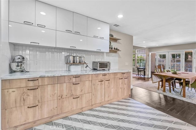 1850 W 186th St, Torrance, CA 90504 - kitchen featuring open shelves, modern cabinets, light stone counters, backsplash, and recessed lighting