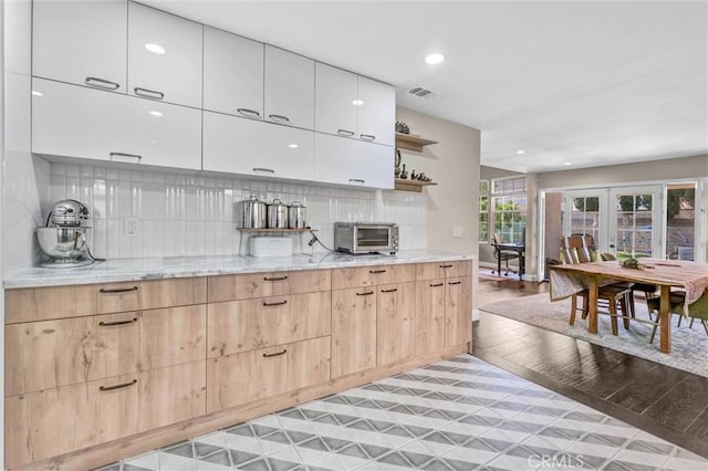 1850 W 186th St, Torrance, CA 90504 - kitchen featuring open shelves, modern cabinets, light stone counters, decorative backsplash, and recessed lighting