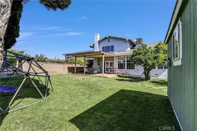 1850 W 186th St, Torrance, CA 90504 - back of house featuring a fenced backyard, french doors, a chimney, a patio, and stucco siding