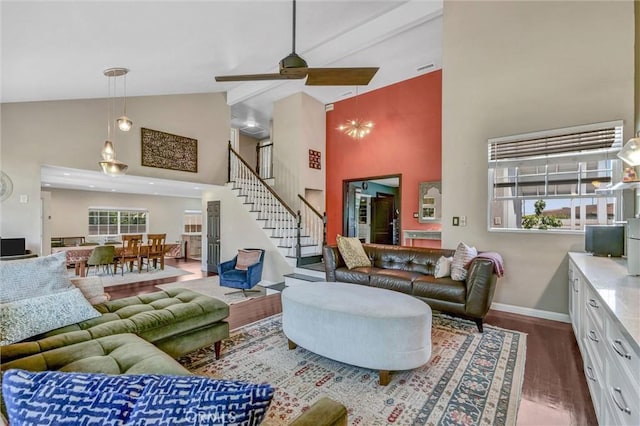 1850 W 186th St, Torrance, CA 90504 - living room with high vaulted ceiling, stairs, dark wood-style floors, and a ceiling fan