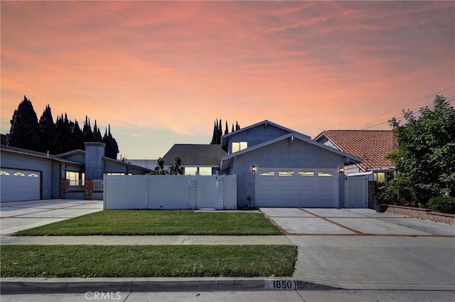 1850 W 186th St, Torrance, CA 90504 - view of front facade featuring an attached garage, driveway, and a gate
