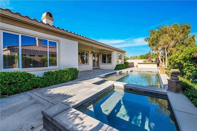 80465 Paseo De Tiempo, Indio, CA 92201 - swimming pool featuring an in-ground hot tub, a patio area, french doors, and ceiling fan