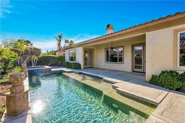 80465 Paseo De Tiempo, Indio, CA 92201 - view of swimming pool with a patio area, a pool with connected hot tub, ceiling fan, and a fenced backyard