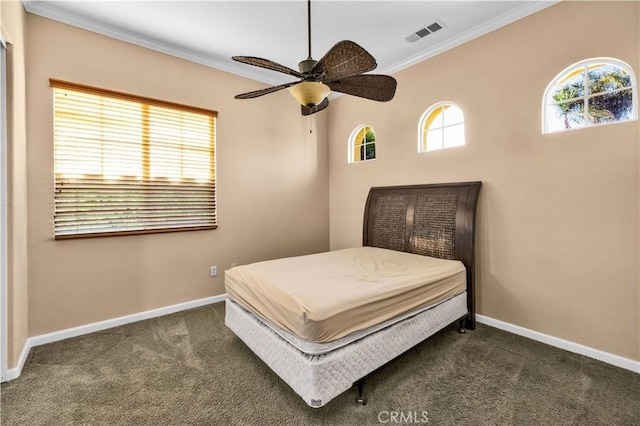 80465 Paseo De Tiempo, Indio, CA 92201 - bedroom featuring crown molding, dark carpet, baseboards, and ceiling fan
