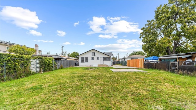 view of yard with a patio area and entry steps