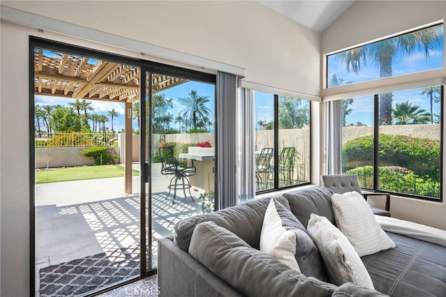 sunroom with vaulted ceiling and plenty of natural light