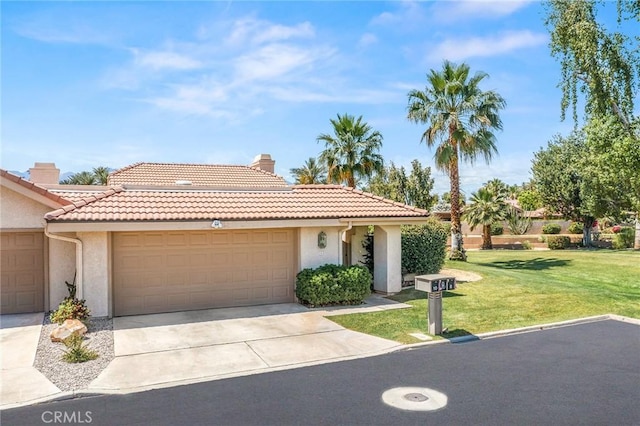 view of front of house featuring a chimney, stucco siding, a tiled roof, and a garage