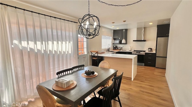 7140 N Muscatel Ave, San Gabriel, CA 91775 - dining room featuring a chandelier, light wood-style flooring, baseboards, and recessed lighting