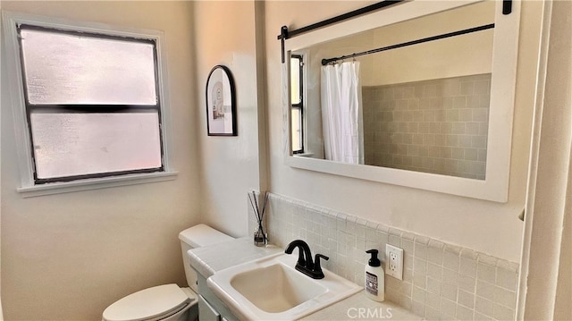 7140 N Muscatel Ave, San Gabriel, CA 91775 - bathroom with a sink, toilet, and curtained shower
