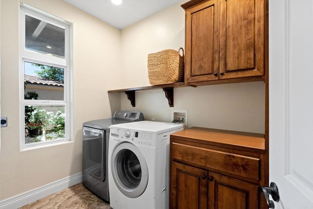 1455 Independence Way, Vista, CA 92084 - laundry room with washer and dryer, baseboards, and cabinet space