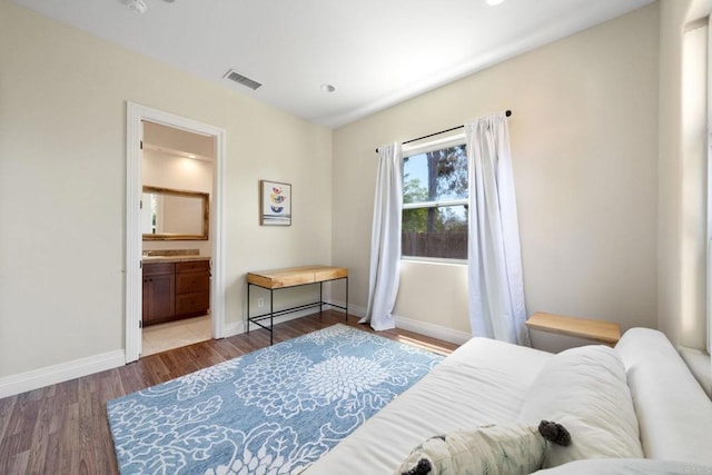 1455 Independence Way, Vista, CA 92084 - bedroom with wood finished floors, baseboards, ensuite bath, and recessed lighting