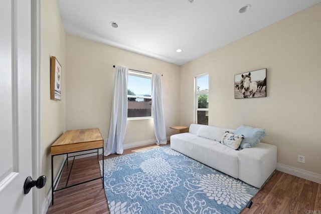 1455 Independence Way, Vista, CA 92084 - living room with wood finished floors, baseboards, and recessed lighting