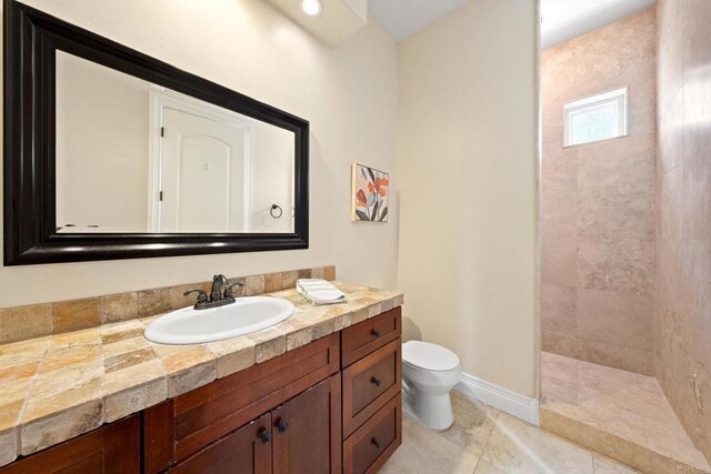 1455 Independence Way, Vista, CA 92084 - full bathroom featuring toilet, vanity, a walk in shower, and baseboards