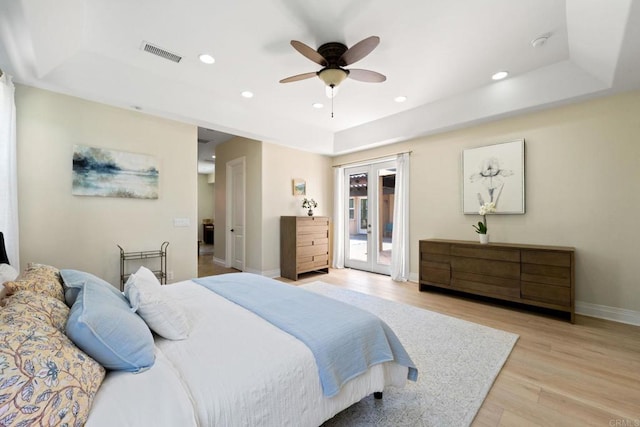 1455 Independence Way, Vista, CA 92084 - bedroom with access to exterior, a tray ceiling, light wood-type flooring, baseboards, and recessed lighting