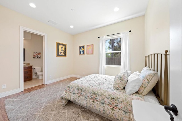 1455 Independence Way, Vista, CA 92084 - bedroom featuring recessed lighting, baseboards, light wood-type flooring, and ensuite bath