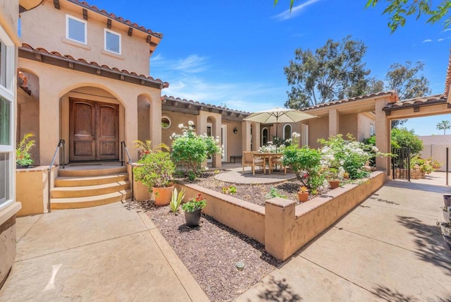 1455 Independence Way, Vista, CA 92084 - view of patio / terrace featuring outdoor dining space and a gate