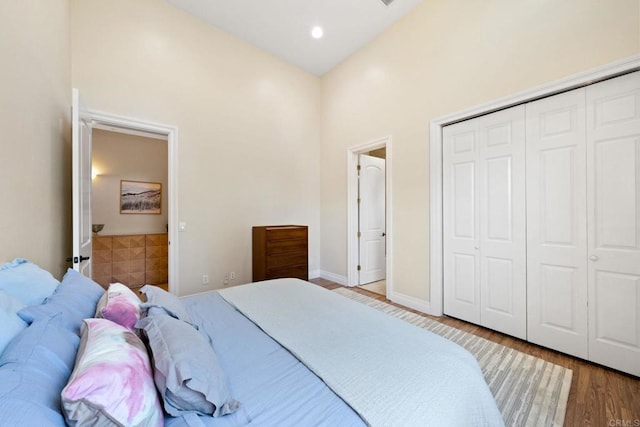 1455 Independence Way, Vista, CA 92084 - bedroom with wood finished floors, a closet, and baseboards