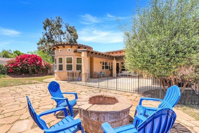 1455 Independence Way, Vista, CA 92084 - fenced backyard with an outdoor fire pit and a patio area