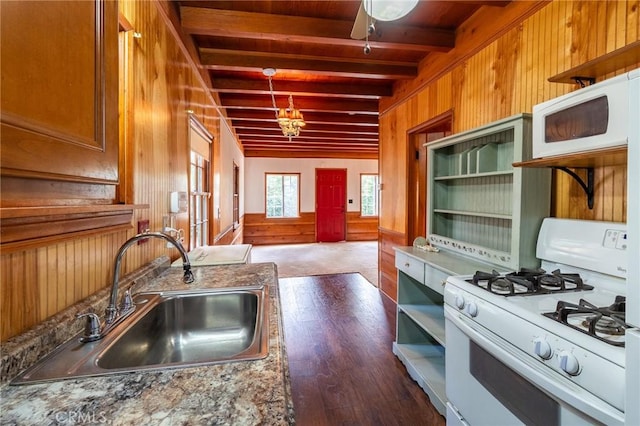 26370 Alpine Ln, Twin Peaks, CA 92391 - kitchen with white appliances, a sink, beam ceiling, wood walls, and open shelves