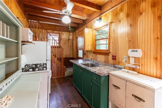 26370 Alpine Ln, Twin Peaks, CA 92391 - kitchen with green cabinetry, a sink, white appliances, wood walls, and dark wood-type flooring