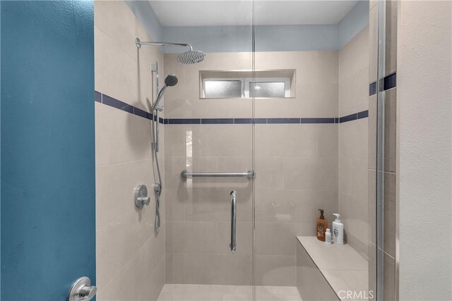 bathroom with a stall shower