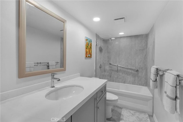 bathroom with toilet, vanity, washtub / shower combination, and recessed lighting