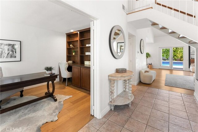 23721 Sarda Rd, Valencia, CA 91355 - office area featuring light tile patterned floors and baseboards