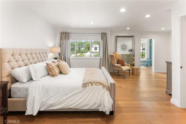 23721 Sarda Rd, Valencia, CA 91355 - bedroom with light wood finished floors and recessed lighting