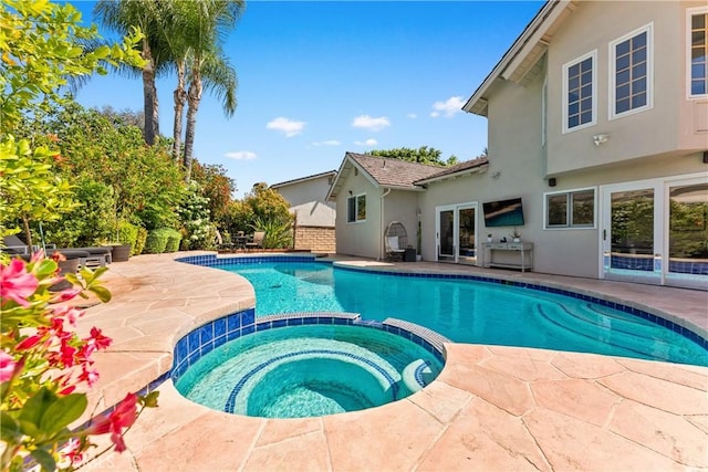 23721 Sarda Rd, Valencia, CA 91355 - view of swimming pool featuring a pool with connected hot tub and a patio area
