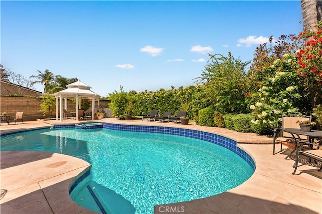 23721 Sarda Rd, Valencia, CA 91355 - view of swimming pool featuring a gazebo, a patio area, a fenced backyard, and a pool with connected hot tub