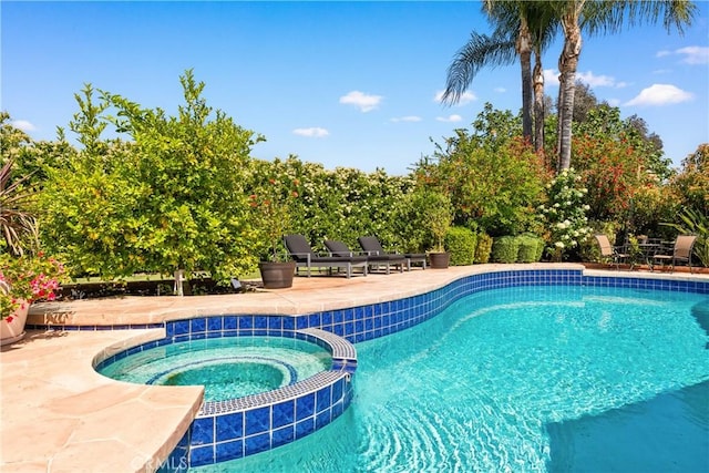 23721 Sarda Rd, Valencia, CA 91355 - view of pool featuring a pool with connected hot tub and a patio area