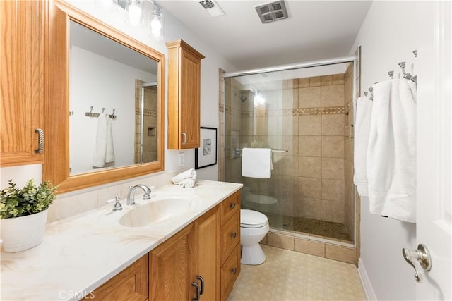 23721 Sarda Rd, Valencia, CA 91355 - full bathroom with vanity, a shower stall, and tile patterned floors