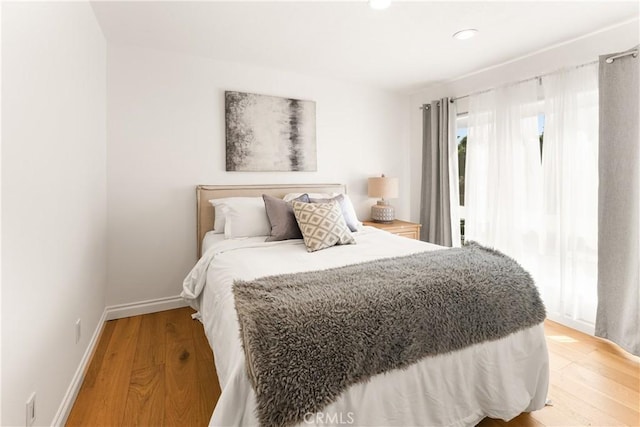 23721 Sarda Rd, Valencia, CA 91355 - bedroom featuring light wood finished floors and recessed lighting