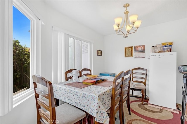 268 Lemon, Irvine, CA 92618 - dining room featuring a chandelier and carpet