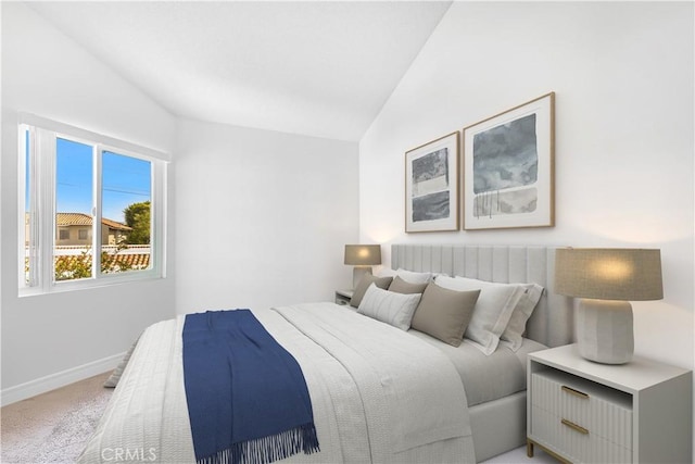 268 Lemon, Irvine, CA 92618 - bedroom featuring light colored carpet, vaulted ceiling, and baseboards